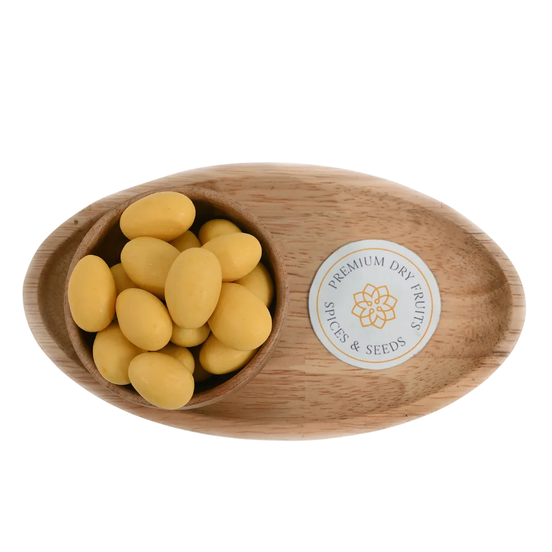 Mango Chocolate Coated Almonds Badam close up – crunchy dry fruits dipped in rich mango chocolate perfect for festive