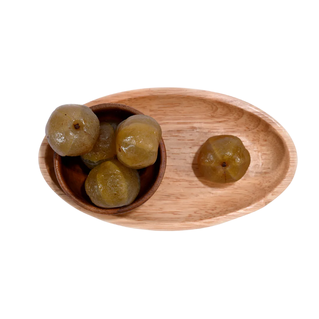 Close-up of Amla Honey Dried with a glossy texture, highlighting the rich honey coating.