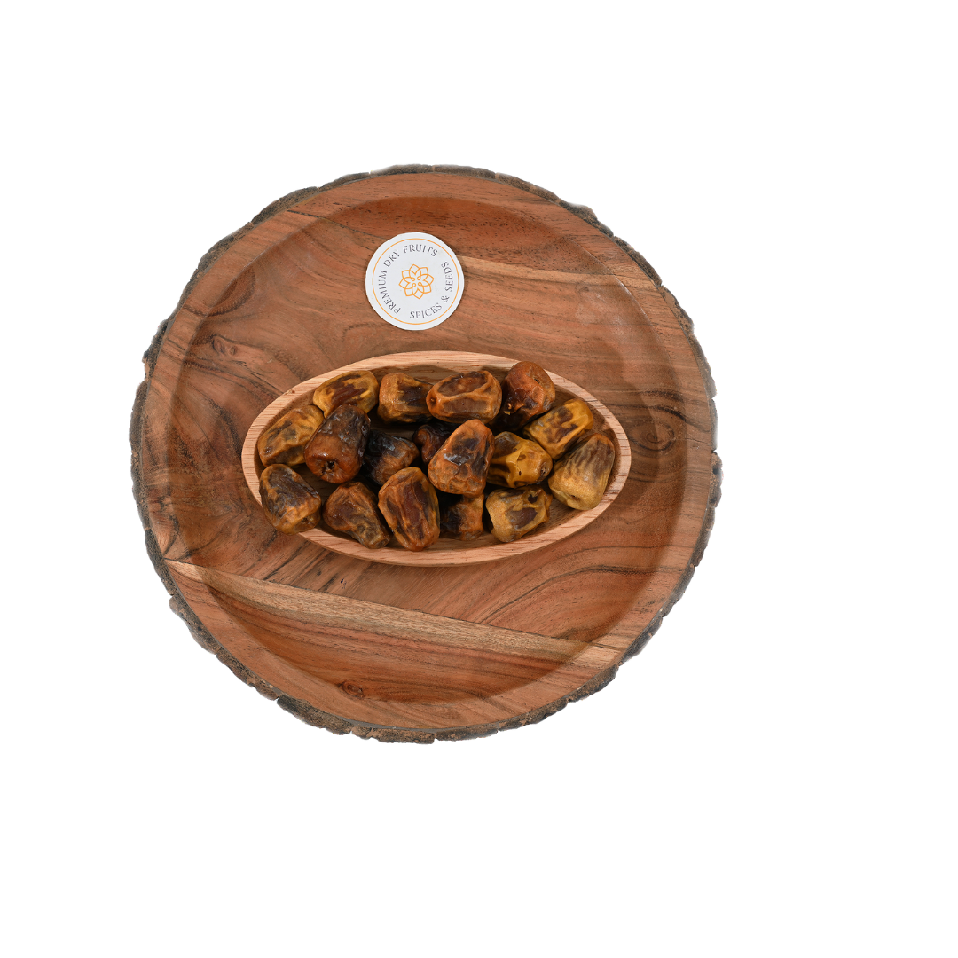 Premium Sukkari dates close‑up – honey caramel texture