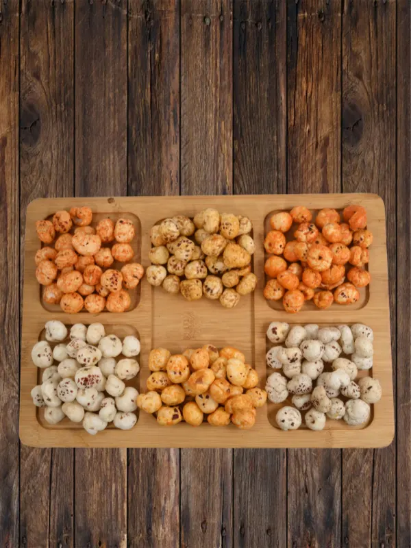 Assorted flavored fox nuts makhana in wooden tray with peri peri, cheese, and masala varieties by House of Rasda