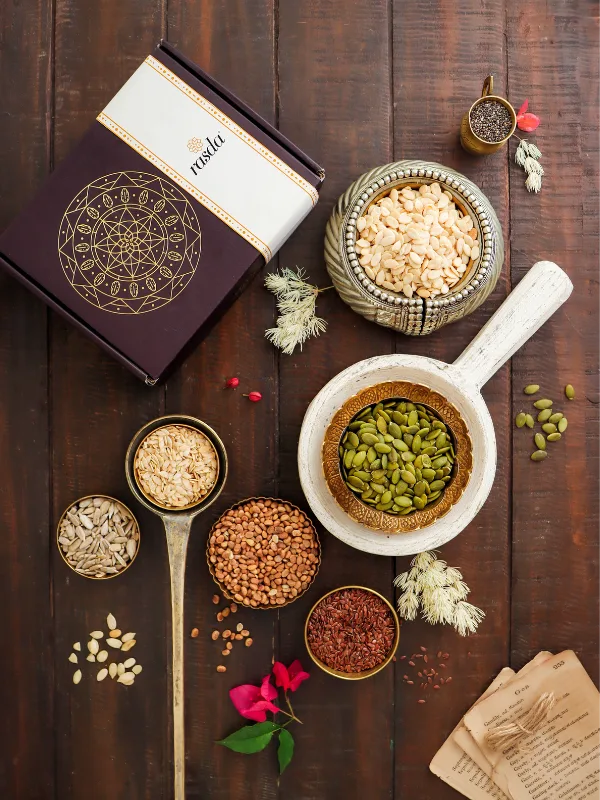 Premium edible seeds like sunflower, flax, and melon seeds displayed with House of Rasda box.