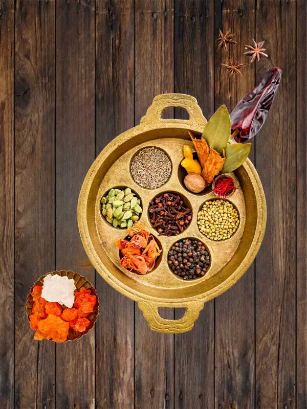 Premium Indian whole spices mix in brass bowl with cardamom, cloves, pepper, and turmeric by House of Rasda.