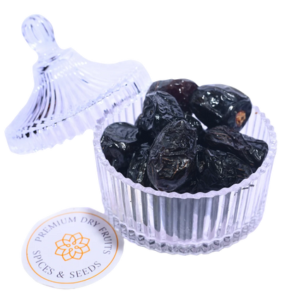 Premium Saudi Ajwa Dates served in glass bowl healthy natural dry fruits rich in nutrients