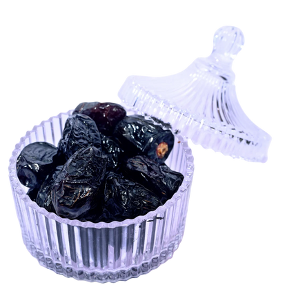 Premium Quality Ajwa Dates from Saudi Arabia in glass bowl rich in potassium and antioxidants