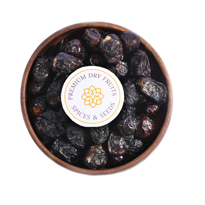 Saudi Arabia Select Ajwa Dates served in wooden bowl soft chewy natural dates for daily health