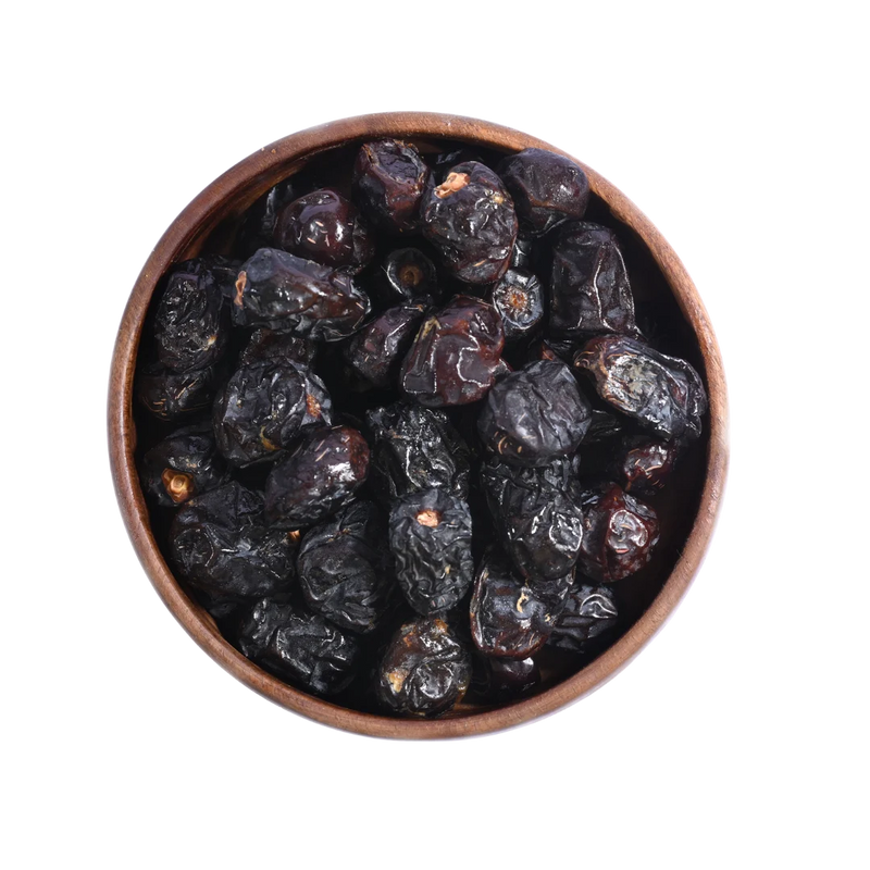 Ajwa Dates Select grade Saudi Arabia in wooden bowl fresh soft nutritious dry fruits healthy snack