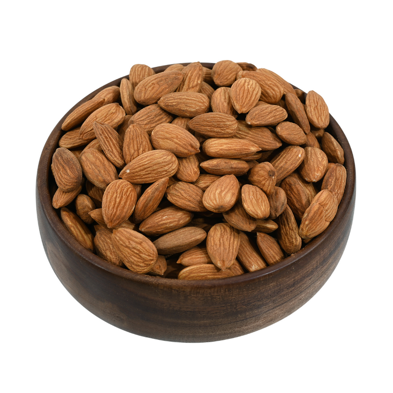 Close-up of plump and glossy almonds jumbo in a wooden bowl, ready to be served as a healthy snack.