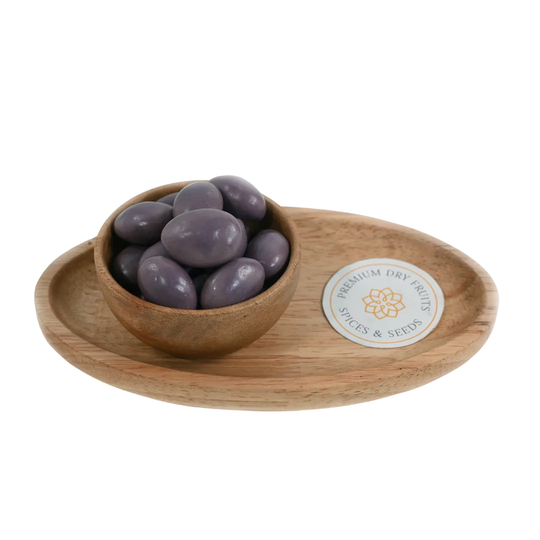 Almonds Blueberry Chocolate Coated Badam in wooden bowl – roasted almonds covered in creamy blueberry chocolate for