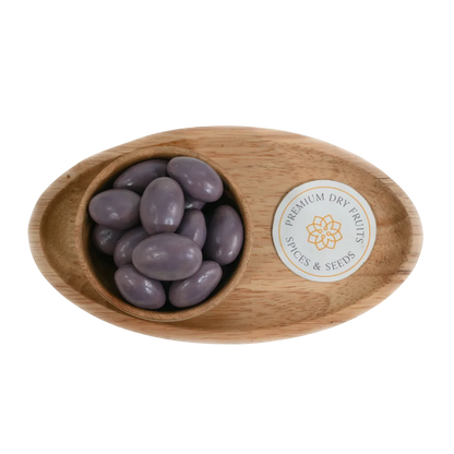 Blueberry Chocolate Coated Almonds Badam close up – crunchy dry fruits dipped in fruity blueberry flavored chocolate