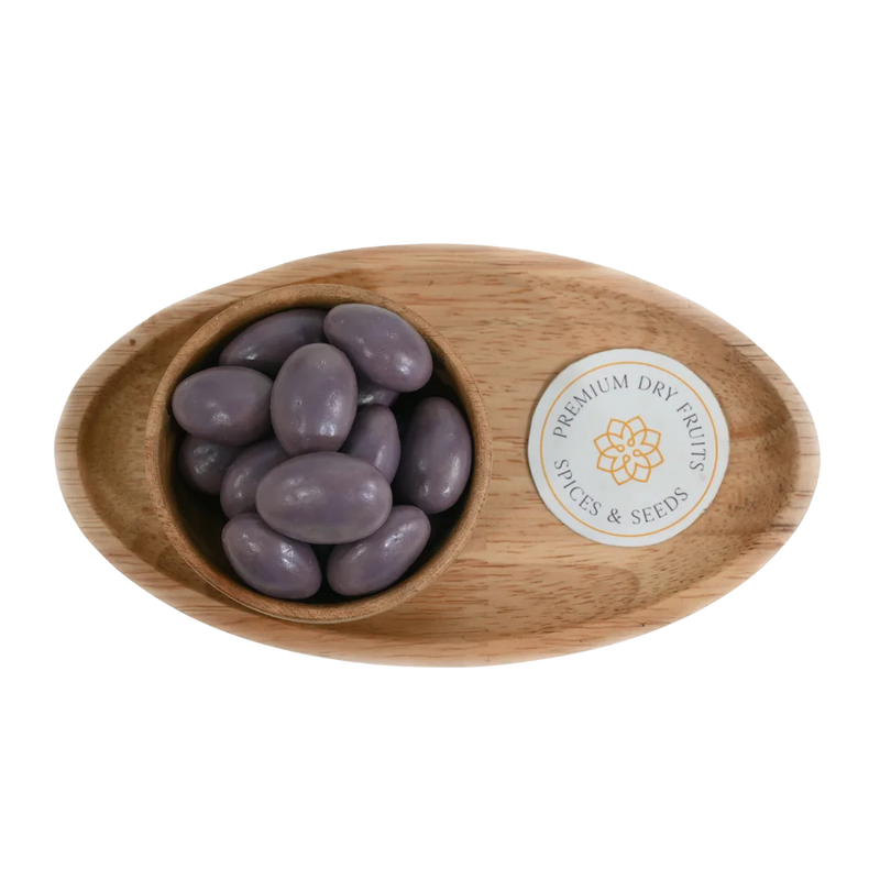 Blueberry Chocolate Coated Almonds Badam close up – crunchy dry fruits dipped in fruity blueberry flavored chocolate perfect for gifting