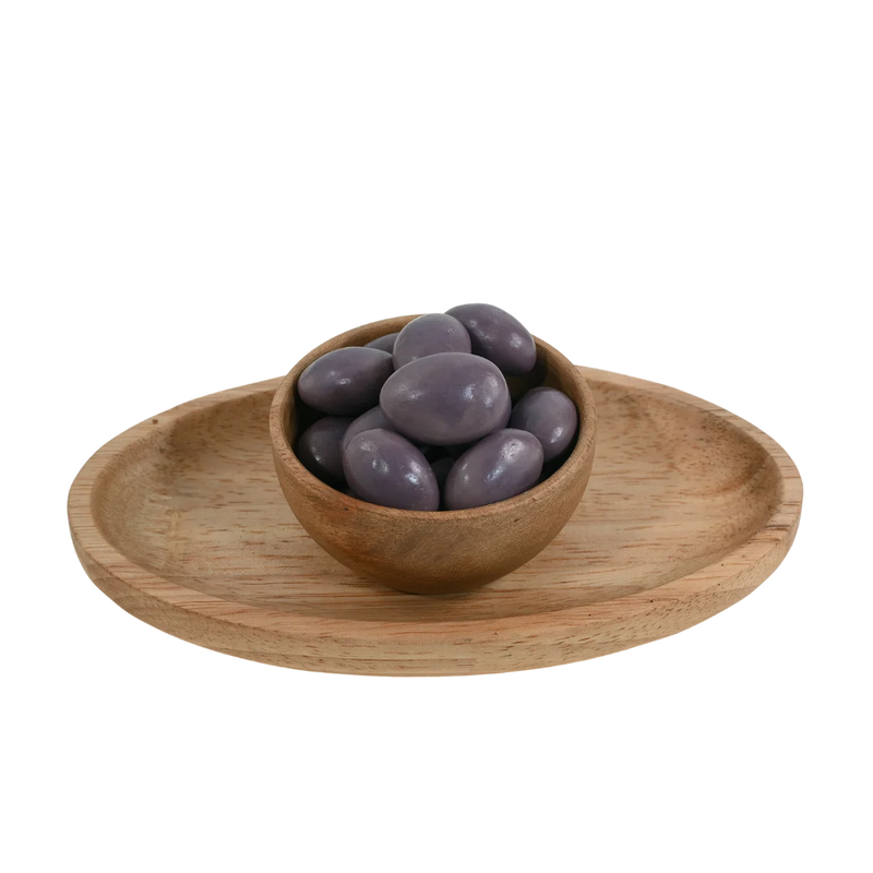 Premium Almonds Blueberry Chocolate Coated Badam on rustic surface – rich sweet coated nuts packed with antioxidants and energy