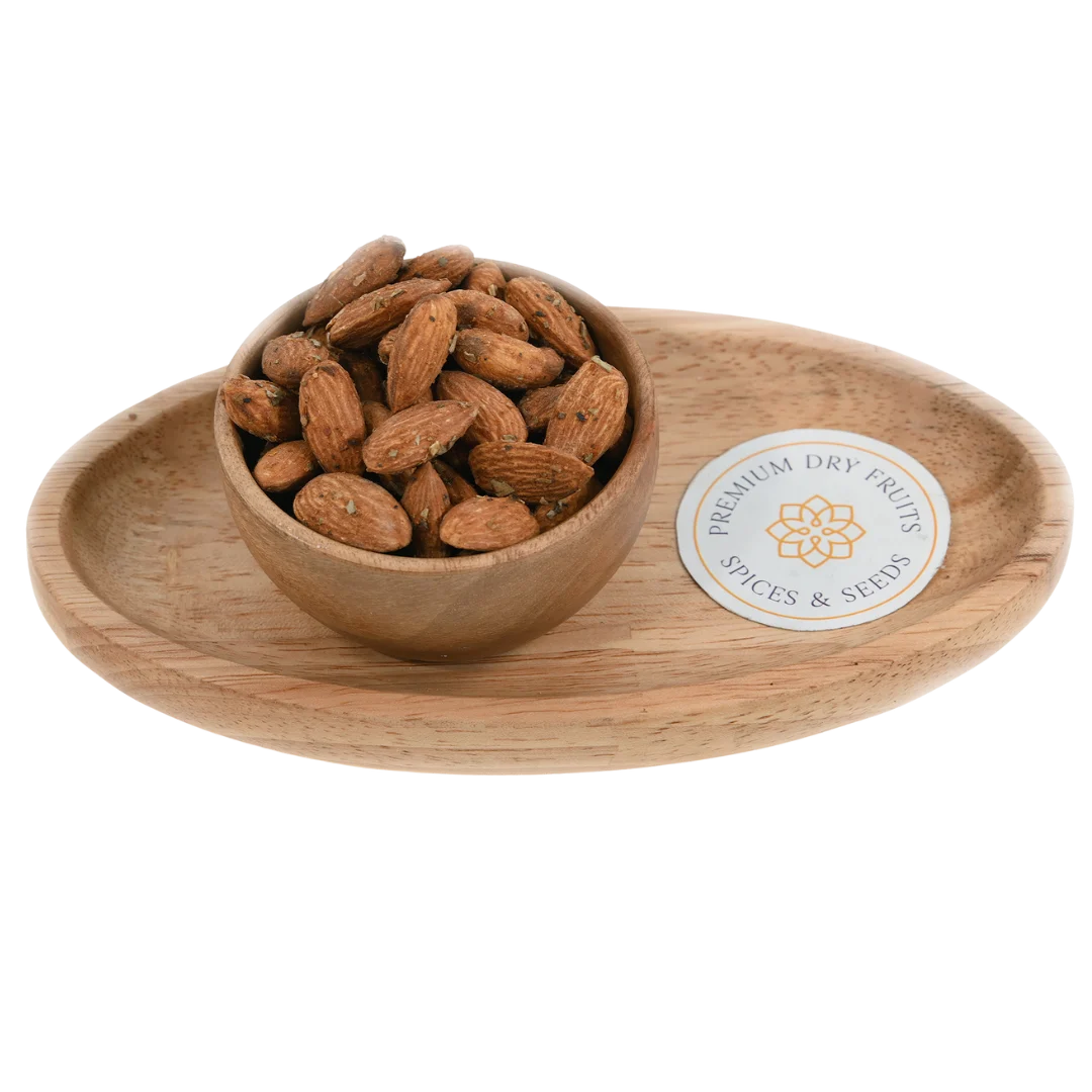 Almonds Chilly Garlic Spiced Badam in wooden bowl – roasted spicy almonds coated with chilly garlic seasoning for crunchy healthy snacks