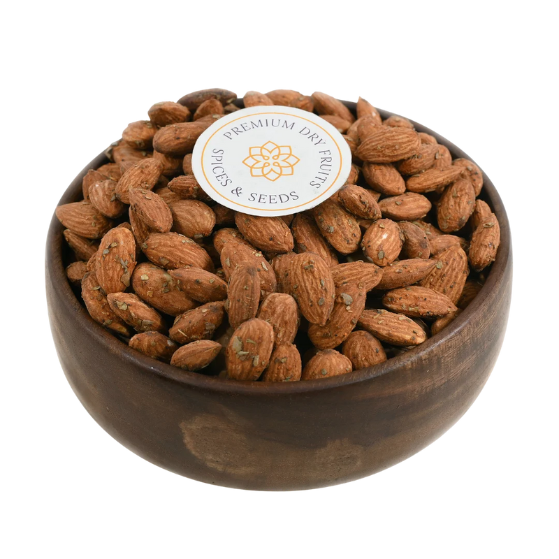 Chilly Garlic Spiced Almonds Badam on rustic background – crunchy roasted nuts with bold seasoning for energy and taste lovers