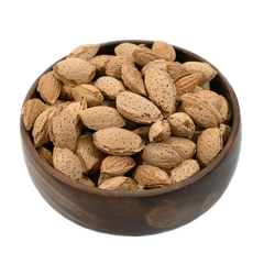 Close-up of Inshelled almonds in a wooden bowl, showcasing their rough surface and organic appeal.