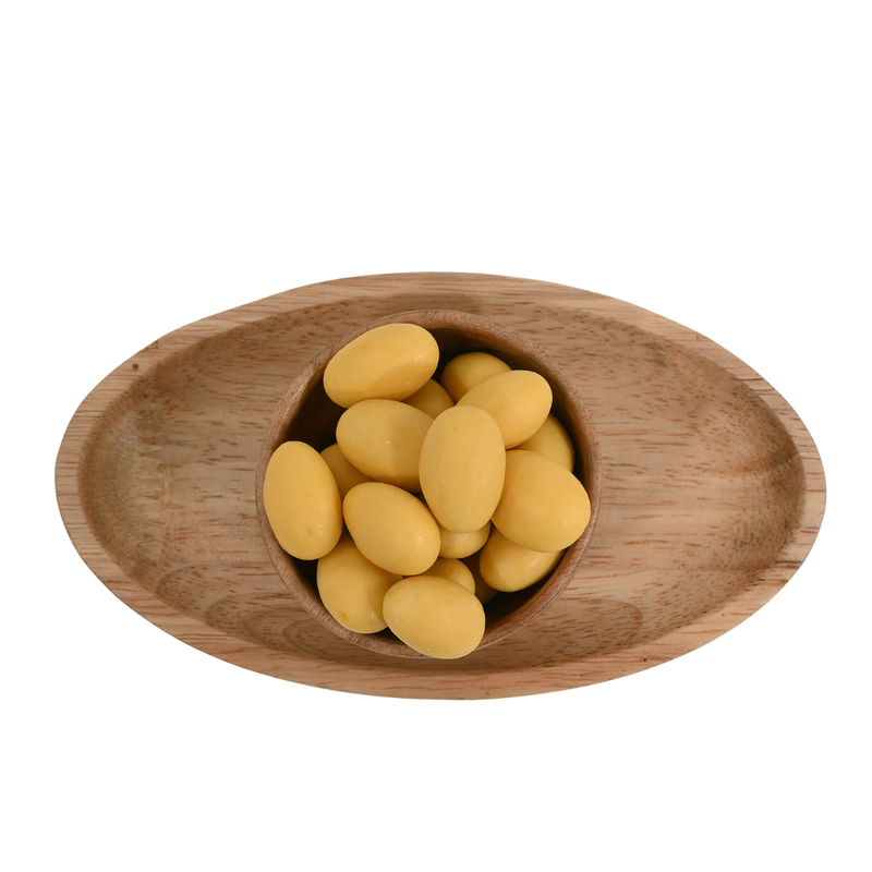 Top view of a wooden bowl filled with Almonds Mango Chocolate Coated, emphasizing the smooth chocolate finish accented by subtle mango notes.