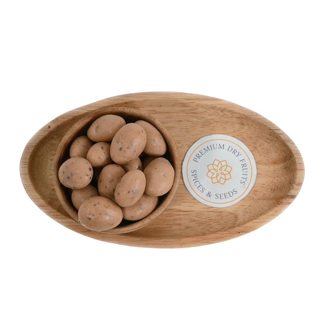 Oreo Chocolate Coated Almonds Badam close up – delicious dry fruits dipped in creamy chocolate and oreo mix perfect for festive gifting