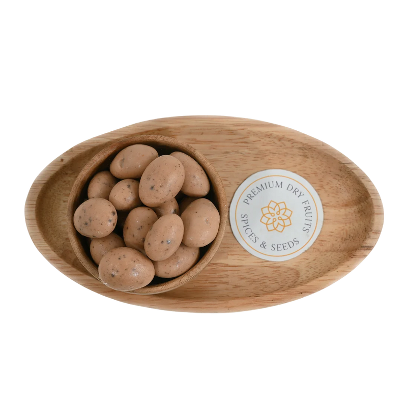 Oreo Chocolate Coated Almonds Badam close up – delicious dry fruits dipped in creamy chocolate and oreo mix perfect for festive gifting