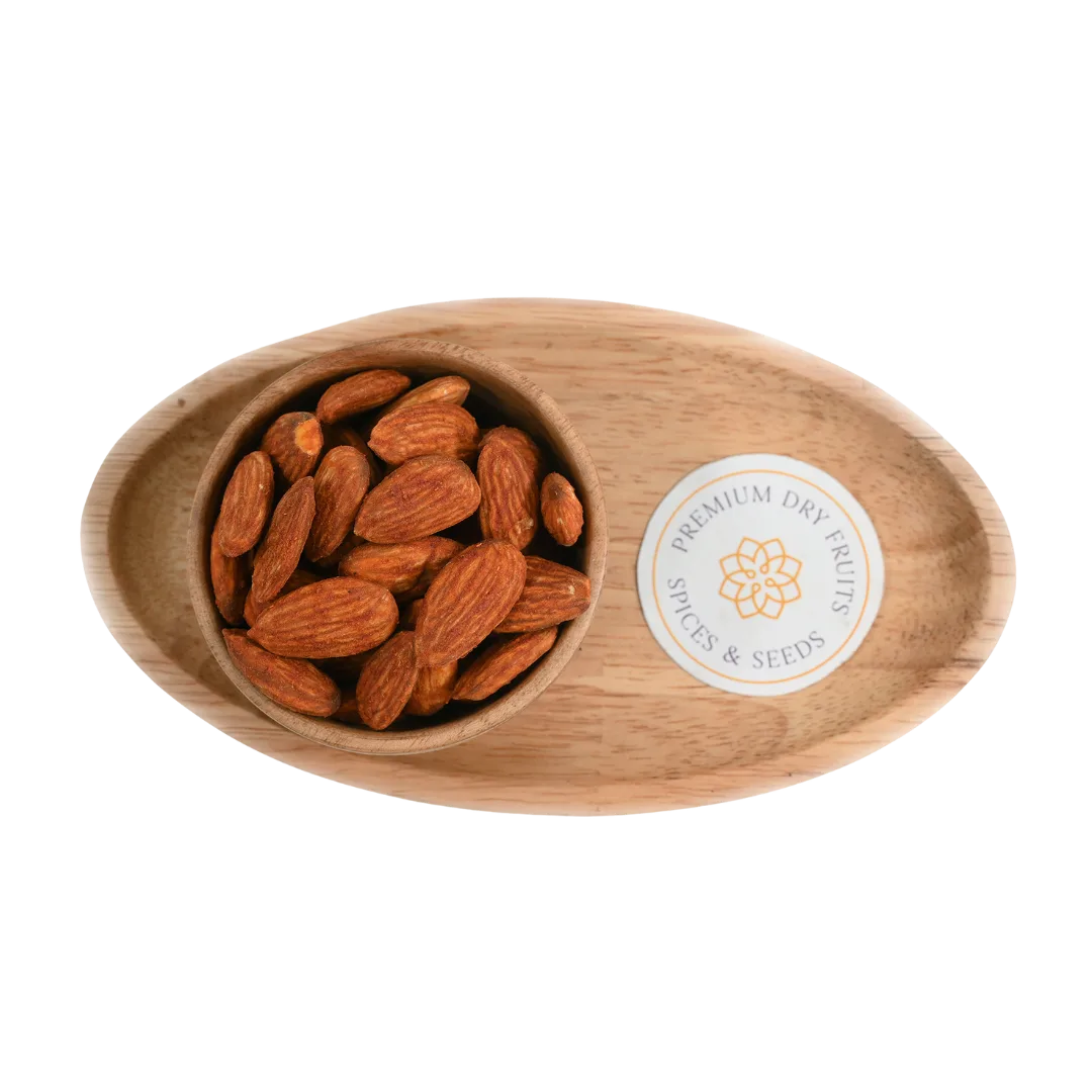 Wooden bowl with Almonds Peri Peri Spiced and a label on a white background