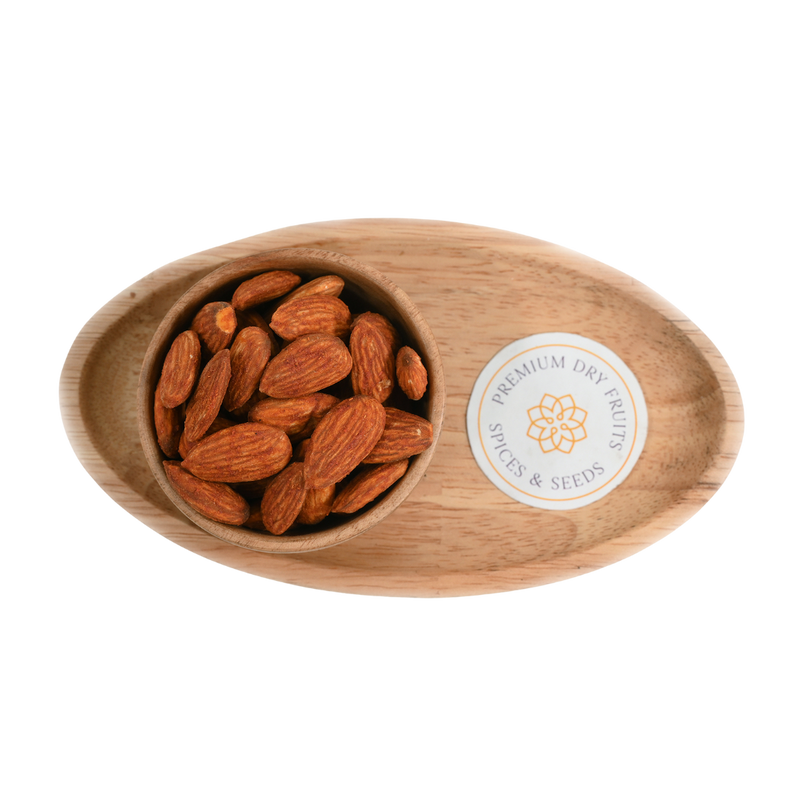 Artistic display of Almonds Peri Peri Spiced laid out on parchment paper, emphasizing their spicy, flavorful appearance.