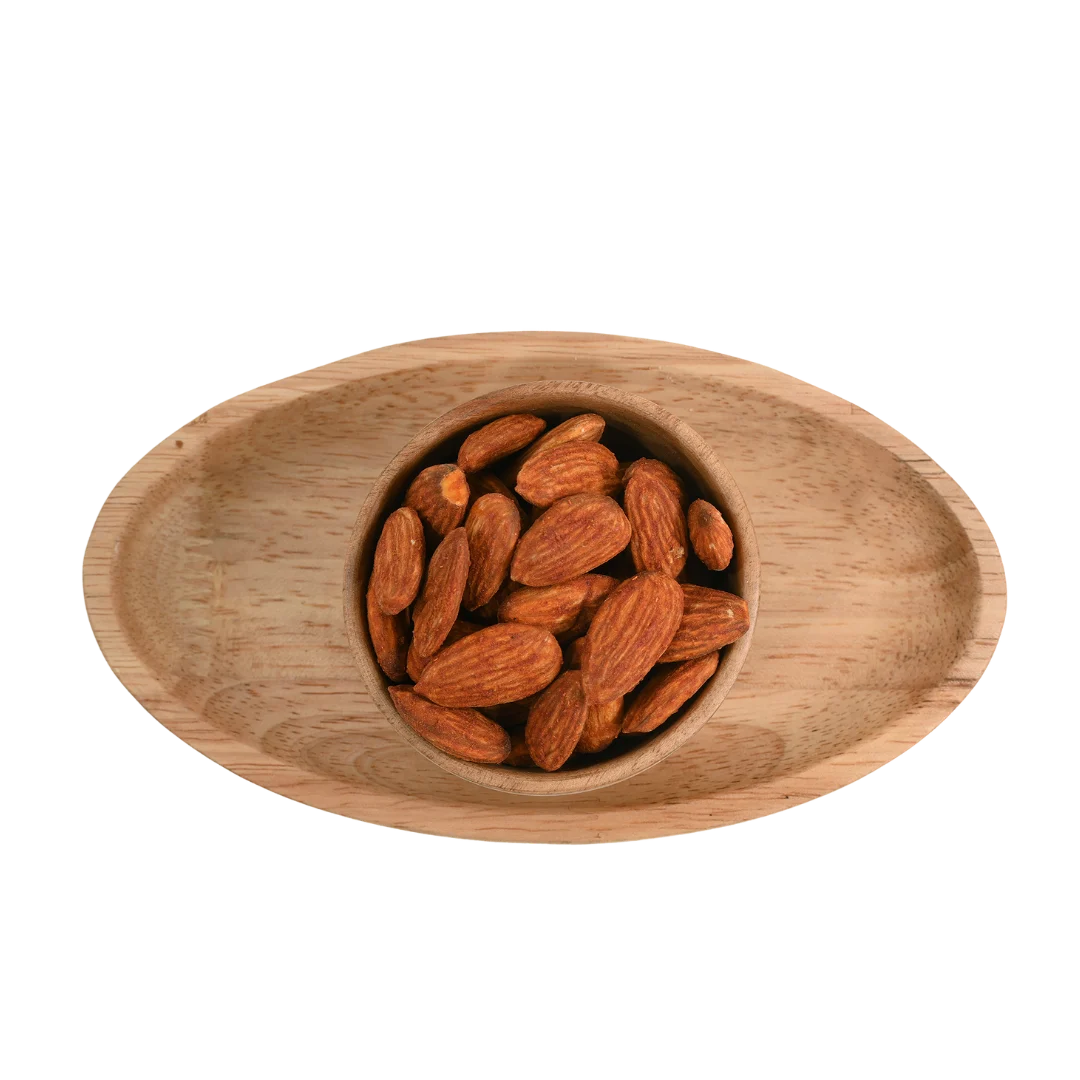 Wooden bowl filled with Almonds Peri Peri Spiced on a white background