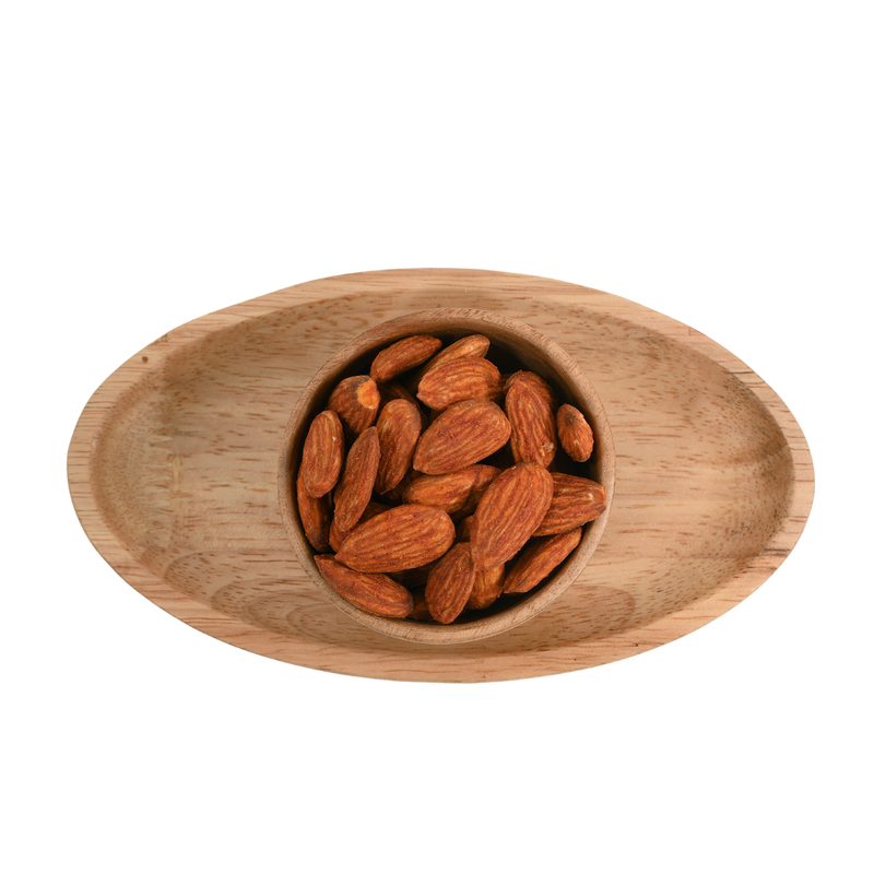 Top view of Almonds Peri Peri Spiced arranged randomly, with each almond glistening with a zesty red spice blend.