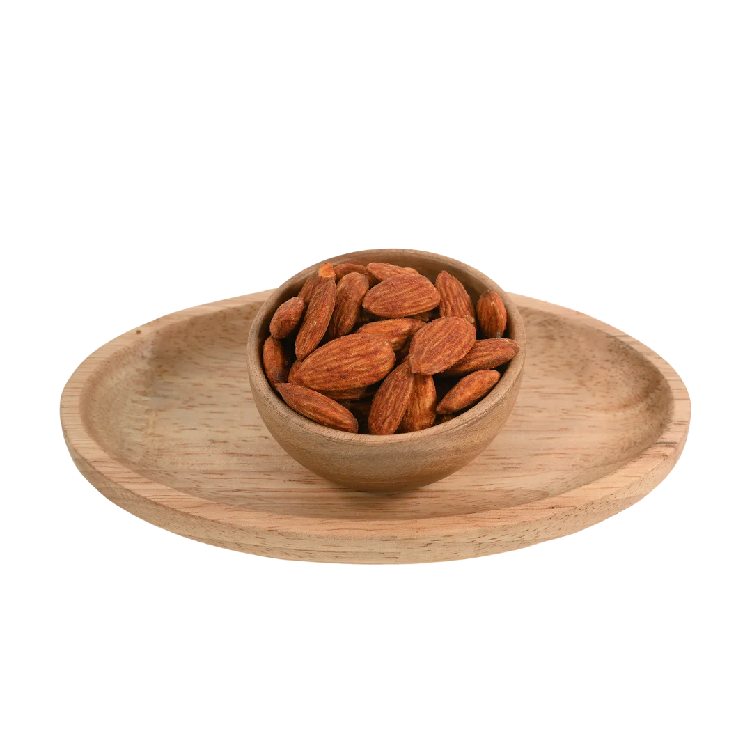 Wooden bowl with Almonds Peri Peri Spiced on a wooden tray on a white background