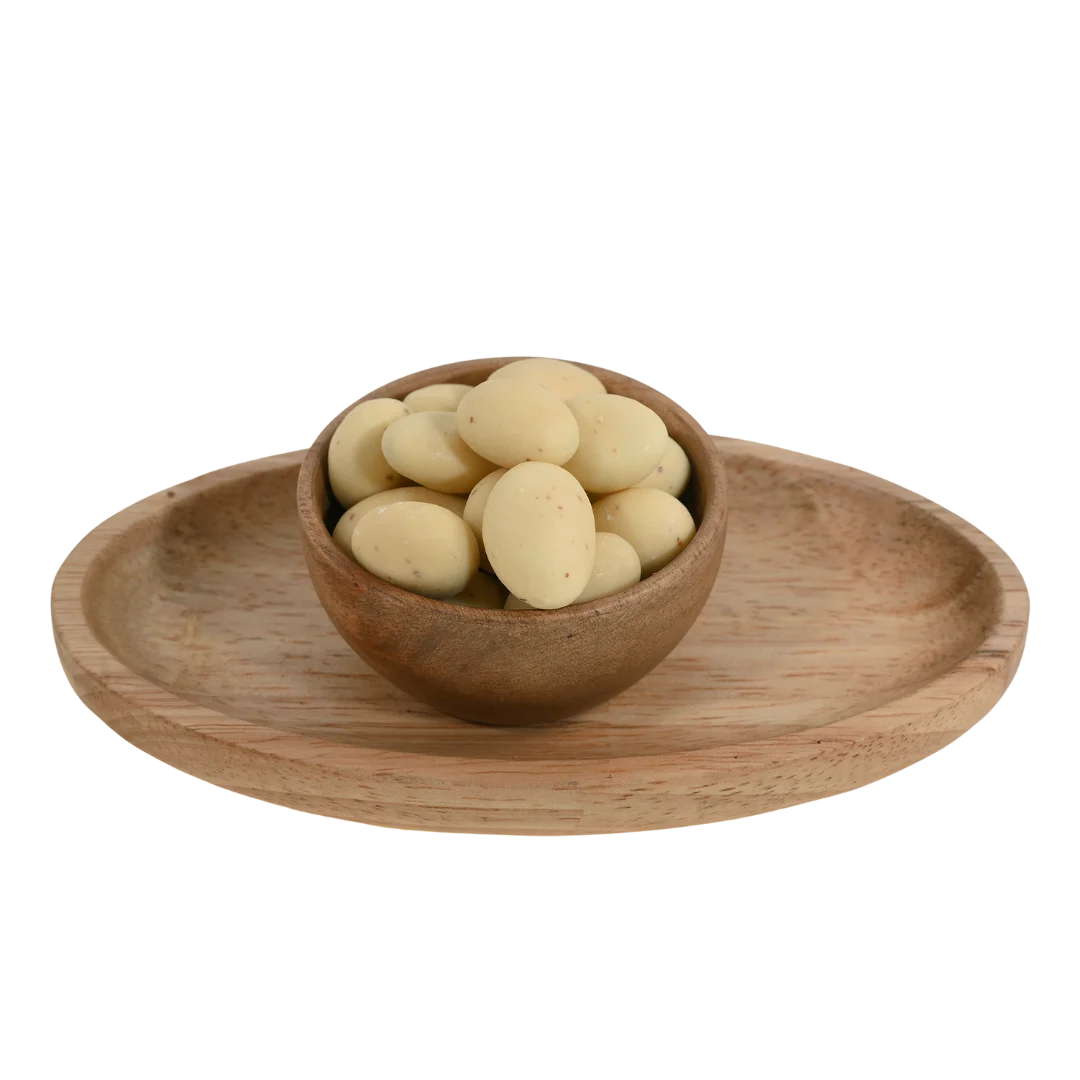 Premium Almonds Rasmalai Chocolate Coated Badam on rustic background – unique flavored almonds rich in protein and sweetness for celebrations