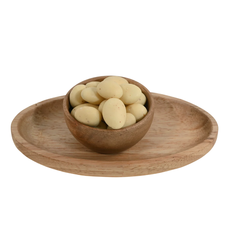 Premium Almonds Rasmalai Chocolate Coated Badam on rustic background – unique flavored almonds rich in protein and sweetness for celebrations