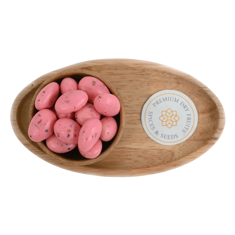 Premium Almonds Rose Petal Chocolate Coated Badam on rustic background – unique fusion of nuts and rose chocolate rich in antioxidants and taste