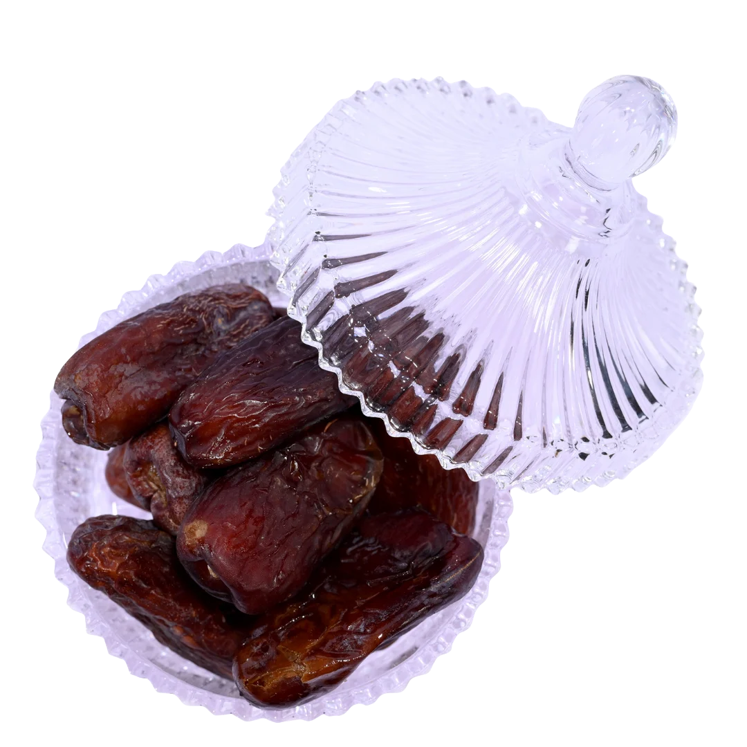 Premium Amber Dates from Saudi Arabia displayed in elegant glass bowl – healthy dry fruit rich in fiber and minerals