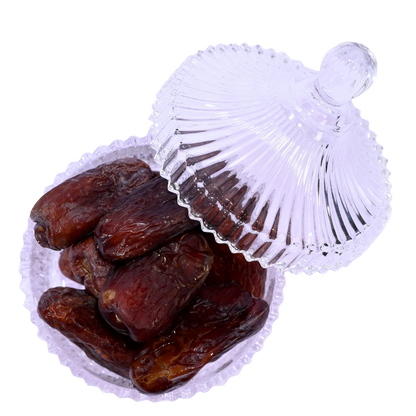 Premium Amber Dates from Saudi Arabia displayed in elegant glass bowl – healthy dry fruit rich in fiber and minerals