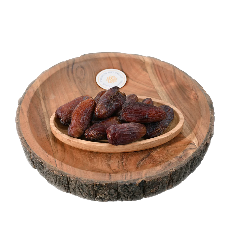 Amber Dates Saudi Arabia Premium in wooden bowl – handpicked Arabian dates rich in taste and nutrition