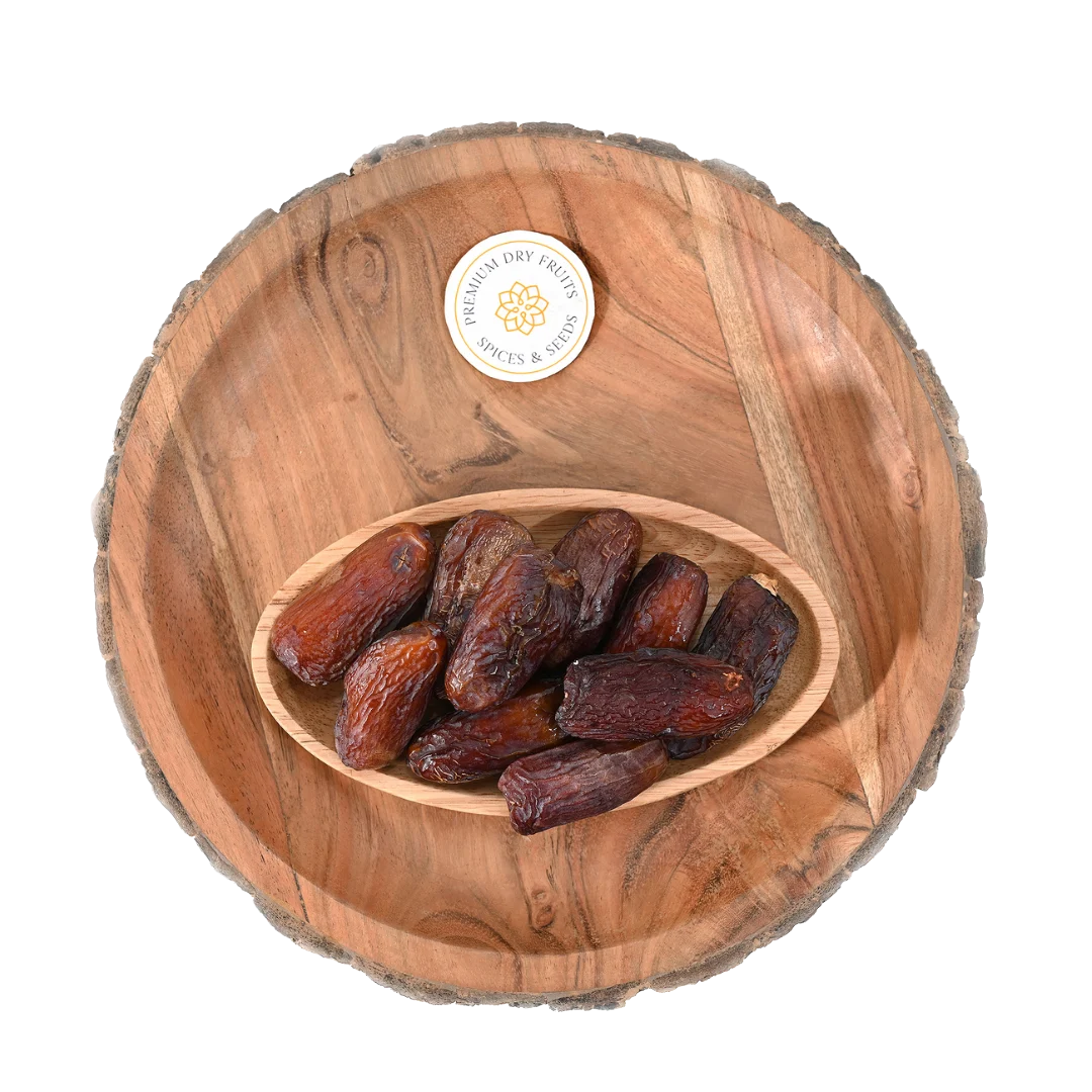 Premium Amber Dates Saudi Arabia in rustic wooden bowl – natural energy booster and immunity enhancer