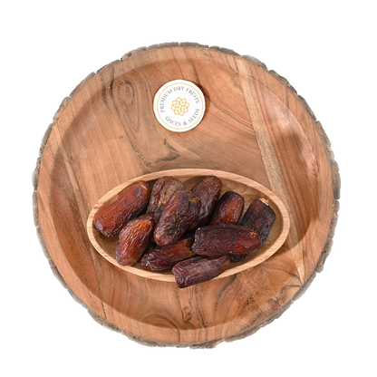 Premium Amber Dates Saudi Arabia in rustic wooden bowl – natural energy booster and immunity enhancer