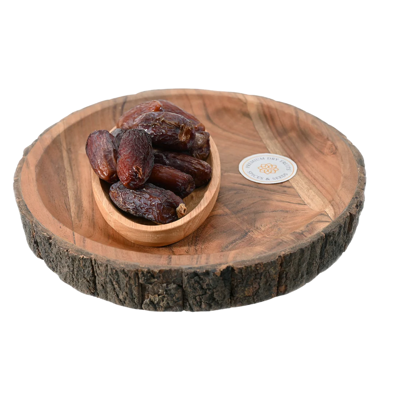 Amber Dates Saudi Arabia Premium quality dry fruits in wooden bowl – soft, chewy, and nutrient-rich dates