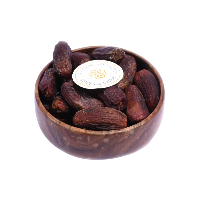 Amber Dates Saudi Arabia Select in wooden bowl – premium Arabian dates rich in taste