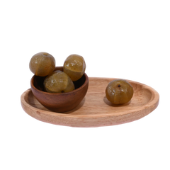Amla Honey Dried spilling slightly from a rustic bowl, emphasizing the sticky, sweet texture