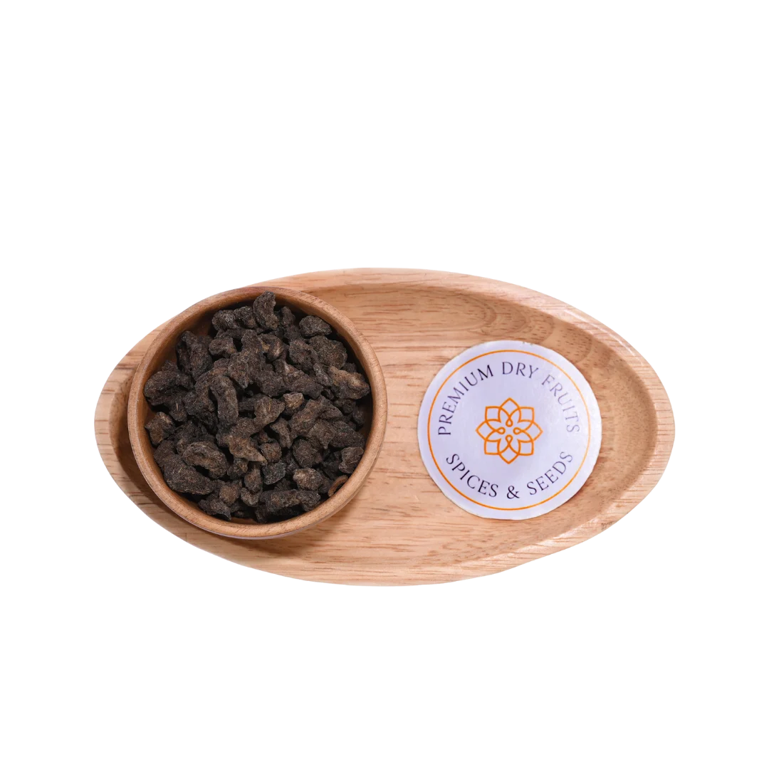 Close-up of Amla Salted Dried showing rough texture and light salt coating