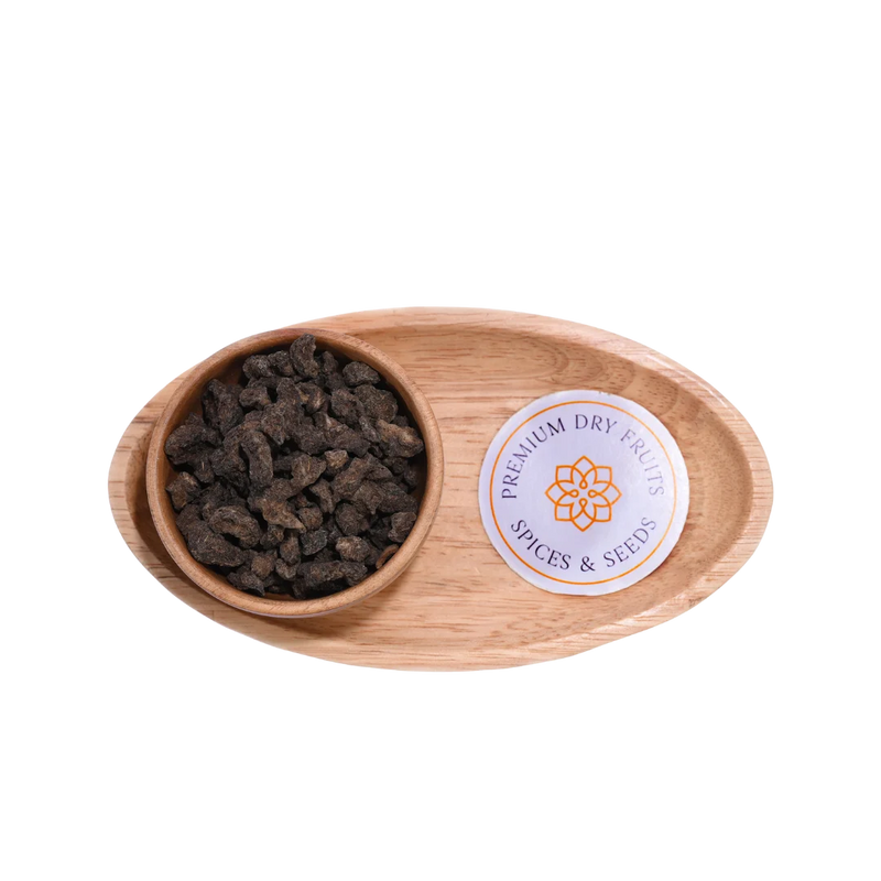 Close-up of Amla Salted Dried showing rough texture and light salt coating