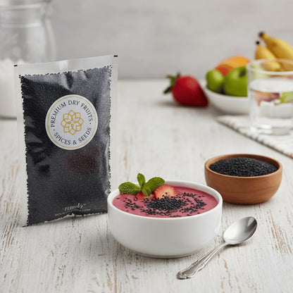 Basil Seeds package with a bowl of fruit salad on a wooden table