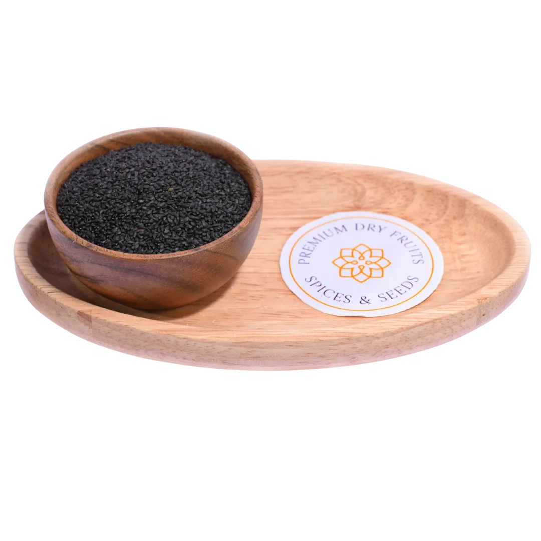 Tiny black Basil Seeds / Sabja Seeds displayed in a wooden bowl, highlighting their glossy surface and natural texture.