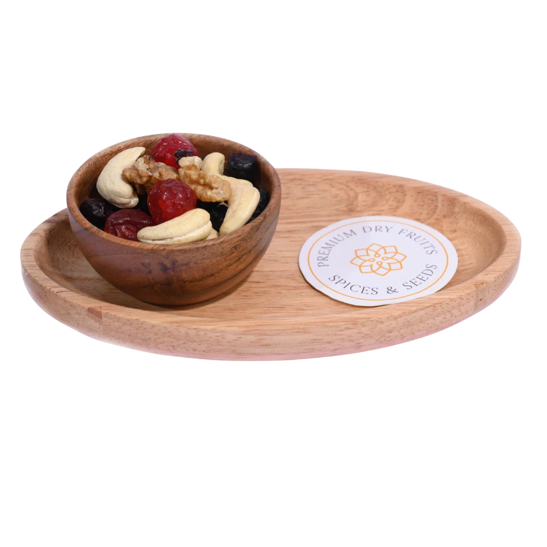 Wooden bowl with dried fruits and nuts  Berry Nutty Trail Mix on a matching wooden tray