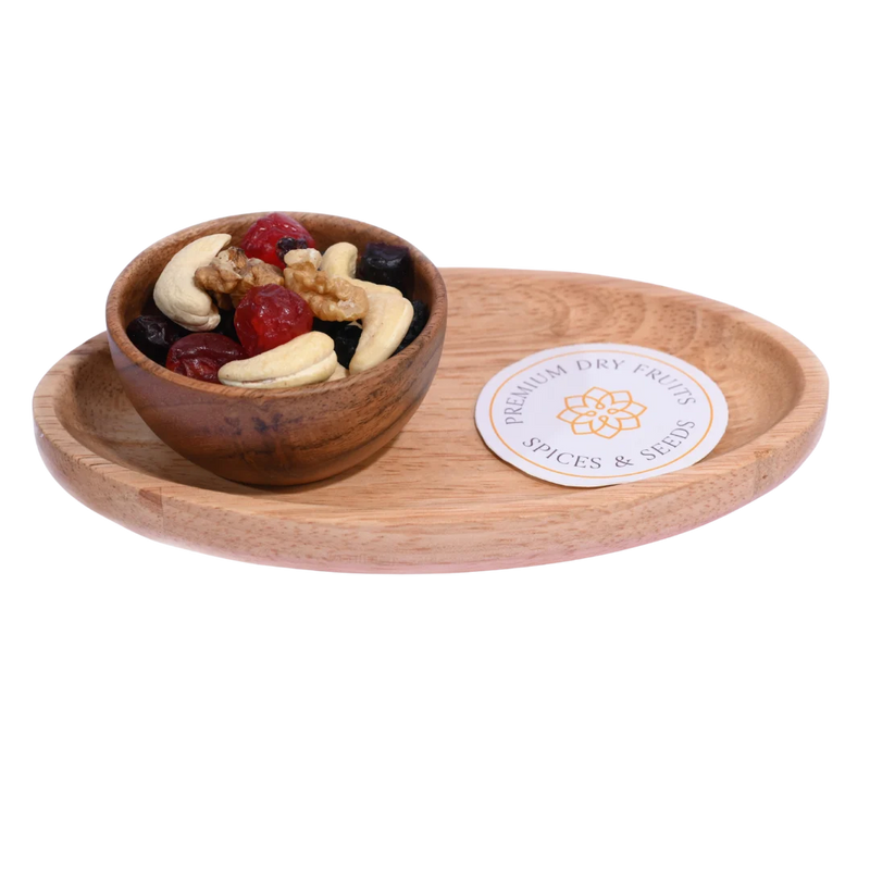 Wooden bowl with dried fruits and nuts  Berry Nutty Trail Mix on a matching wooden tray