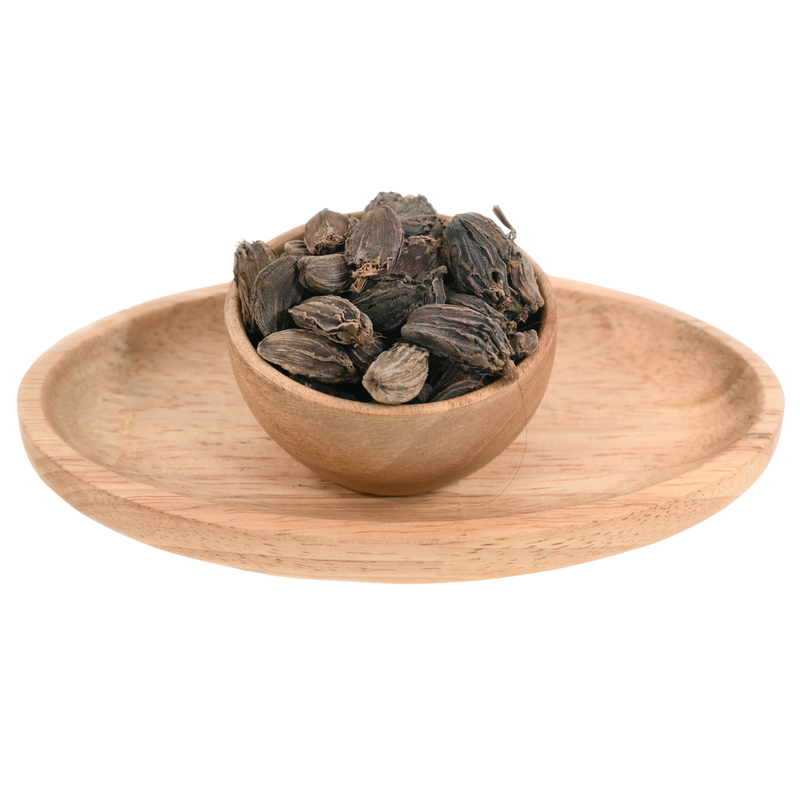 A handful of black cardamom pods, large and rough, with visible ridges and earthy tones.