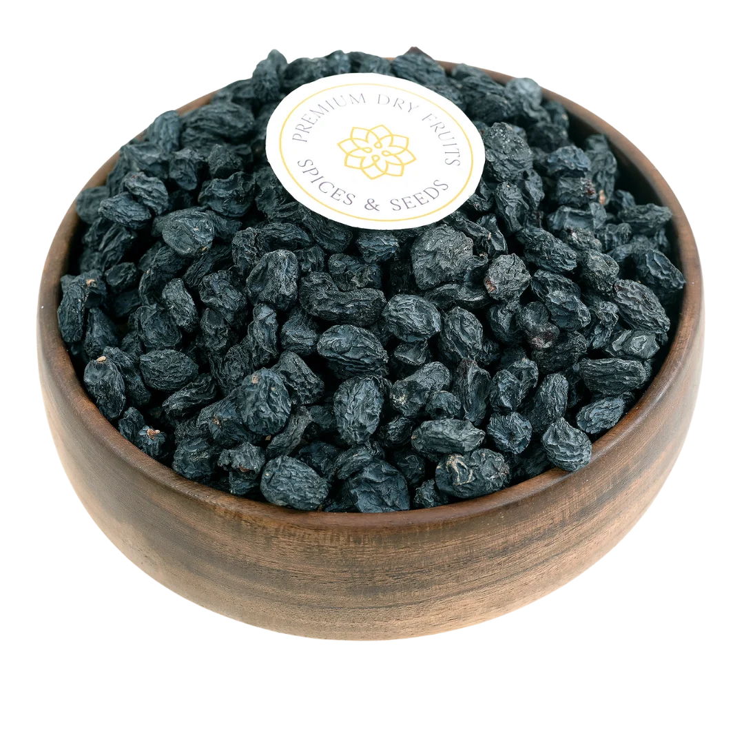 Black Raisins Seedless Kismis Premium Quality in Wooden Bowl – Naturally Sweet Healthy Dry Fruit Rich in Iron and Antioxidants