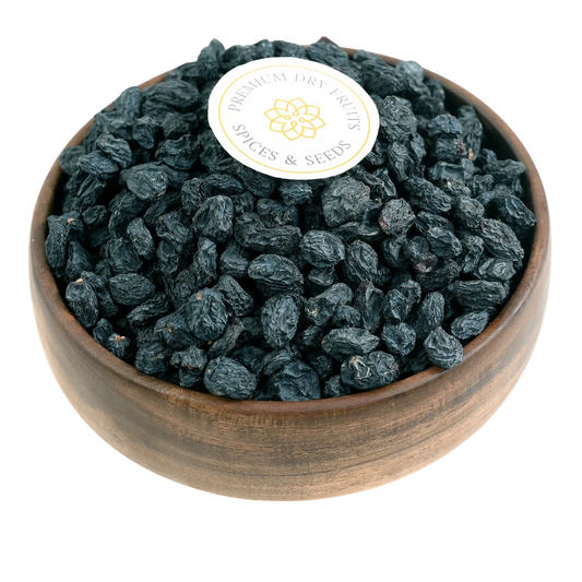 Black Raisins Seedless Kismis Premium Quality in Wooden Bowl – Naturally Sweet Healthy Dry Fruit Rich in Iron and Antioxidants