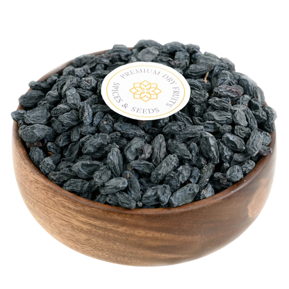 Black Raisins with Seeds Kismis Premium Quality in Wooden Bowl – Naturally Sweet Dry Fruit Rich in Iron and Antioxidants