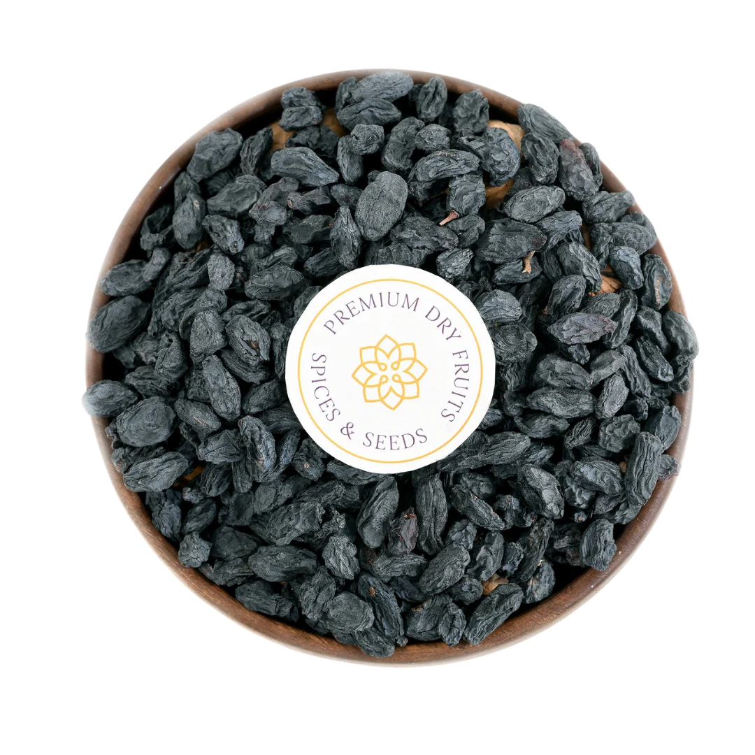 Premium Black Raisins with Seeds or Kismis in Wooden Bowl – Healthy Energy-Boosting Snack Packed with Nutrients