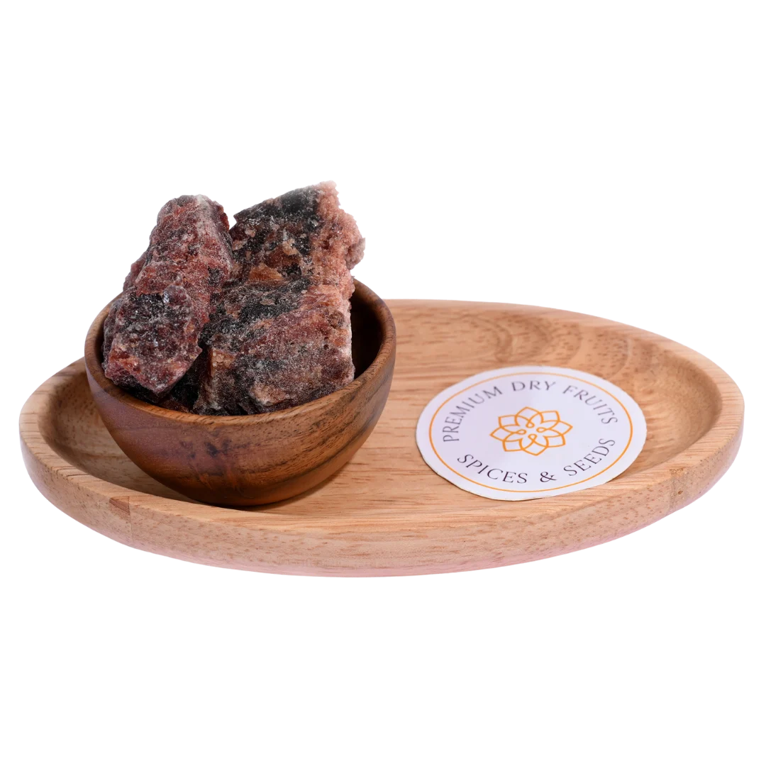 Black rock or salt kaala namak in wooden bowl natural mineral salt for cooking