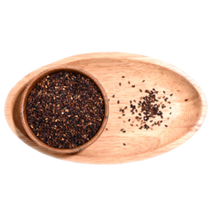 Black sesame seeds sprinkled over a salad, adding contrast and texture.